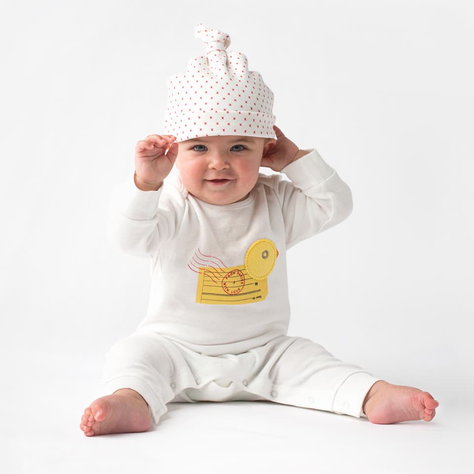 Duck baby grow and red kisses knot hat by From Babies with Love