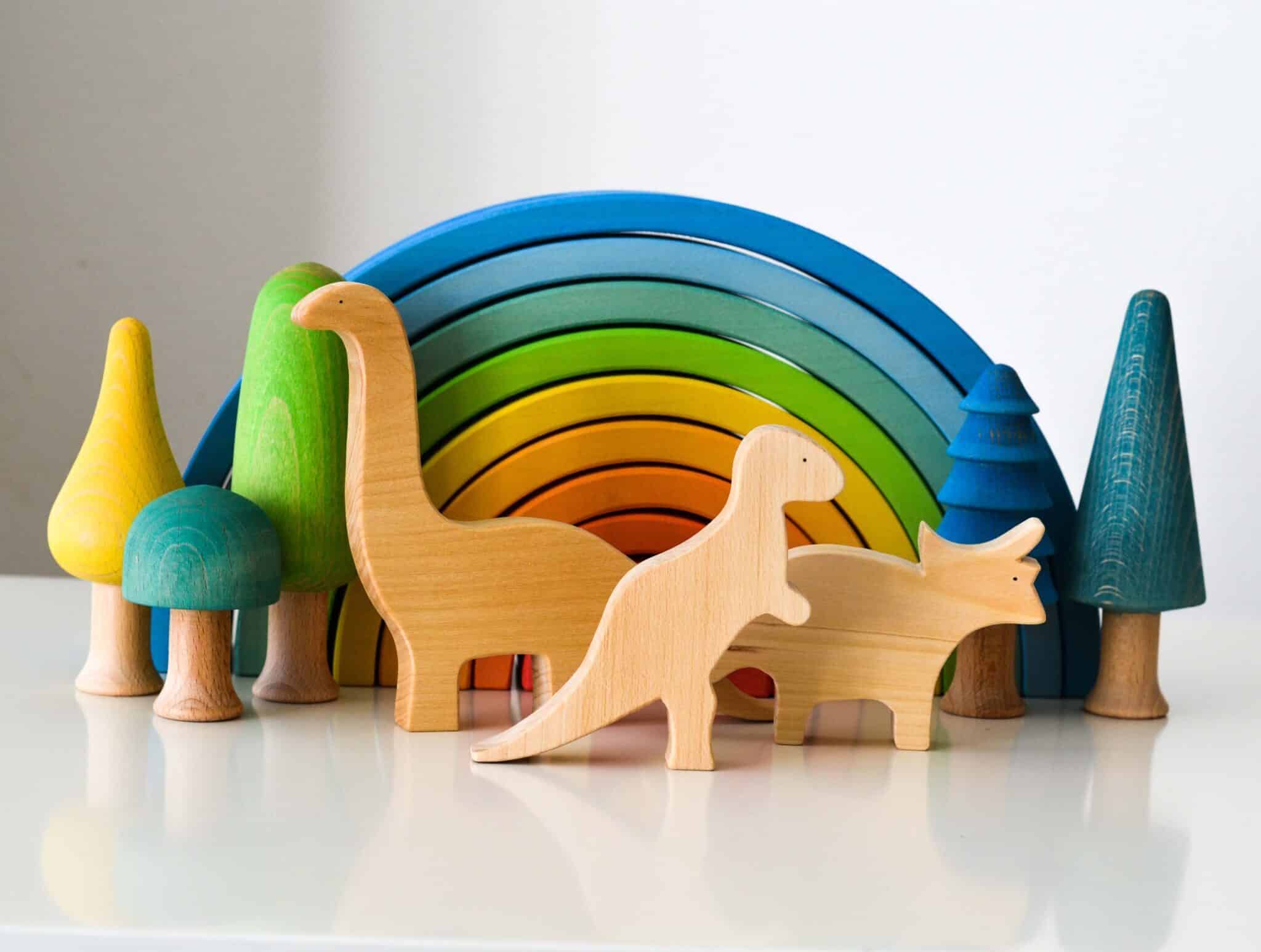 Ocamora dinosaurs, trees and rainbow